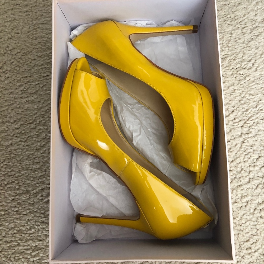 Yellow pumps by Ivanka  Trump
